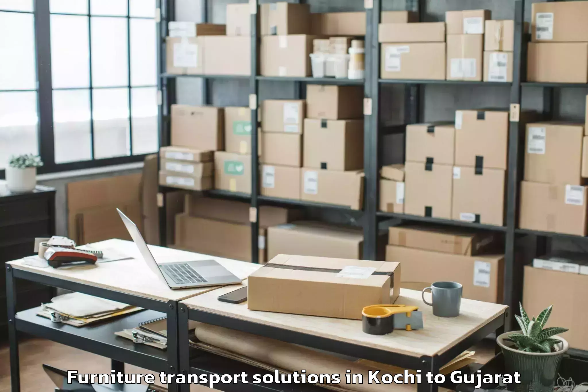 Professional Kochi to Keshod Airport Ixk Furniture Transport Solutions